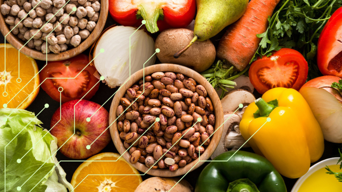 Fresh fruits, vegetables and beans arranged with digital tech lines showing AI food innovation.