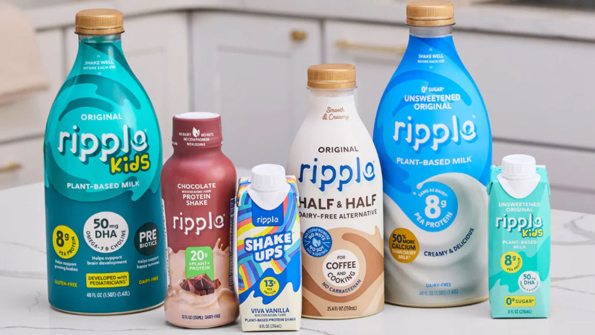 Assorted Ripple plant-based milk and protein shake products displayed on a counter